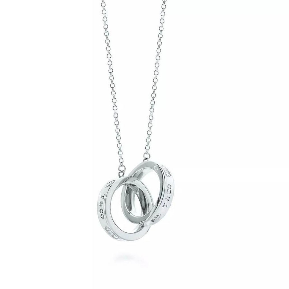 Sold!Tiffany & Co sterling silver interlocking necklace